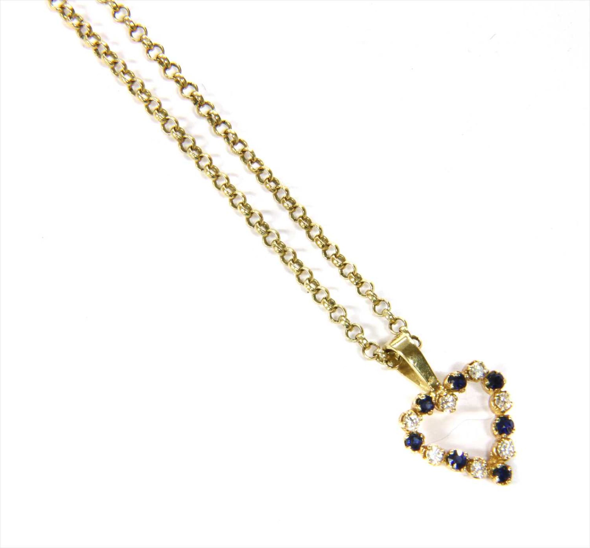 A 9ct gold diamond and sapphire heart pendant,