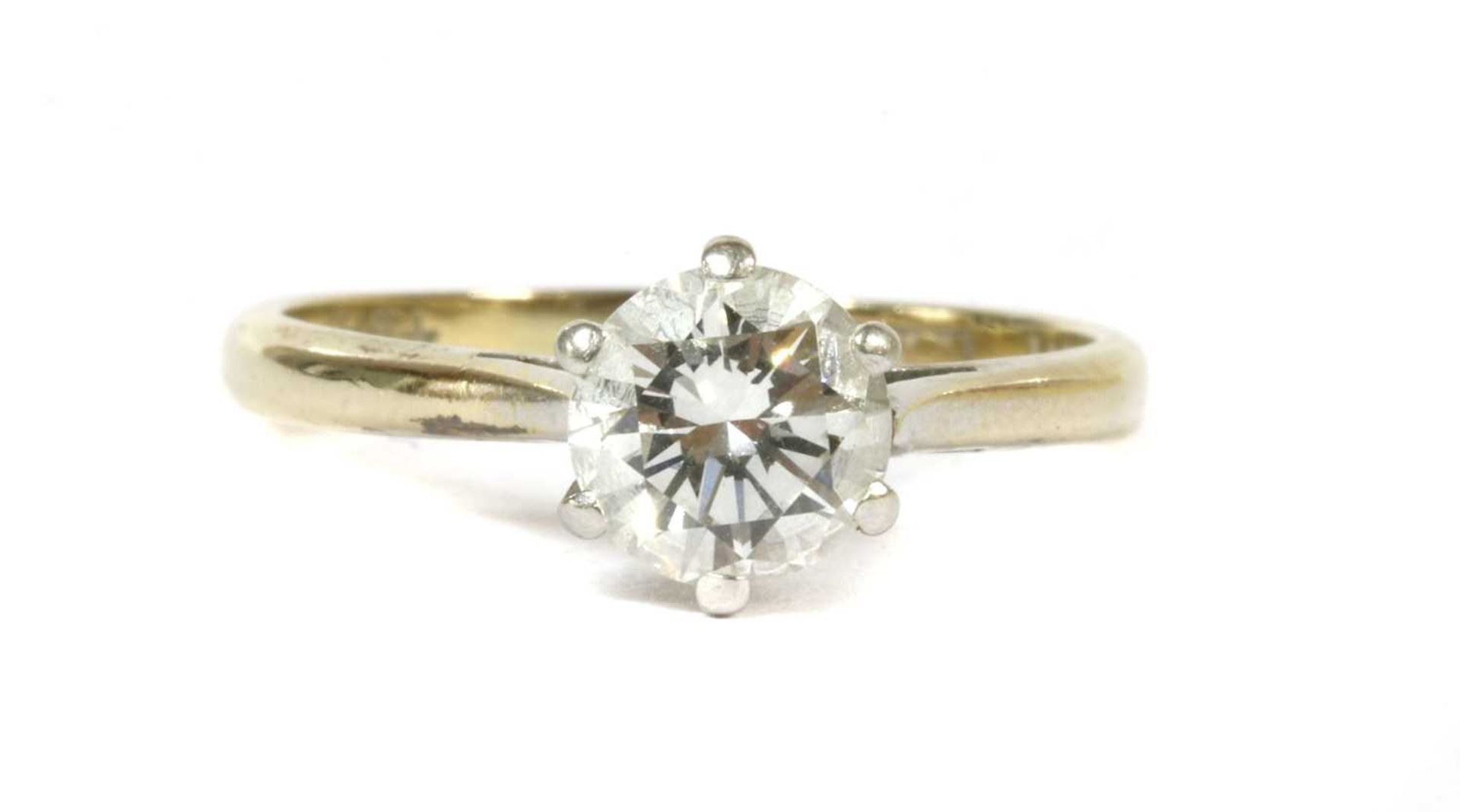 A white gold and platinum single stone diamond ring,