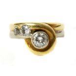 An 18ct two colour gold diamond ring,