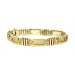 A gold bracelet,