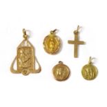 A quantity of gold religious pendants,
