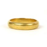 A 22ct gold D section wedding ring,