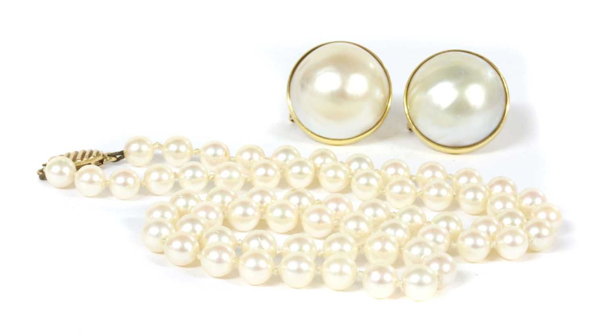 A pair of gold mabé pearl earrings,