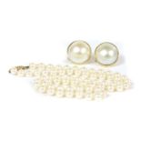 A pair of gold mabé pearl earrings,