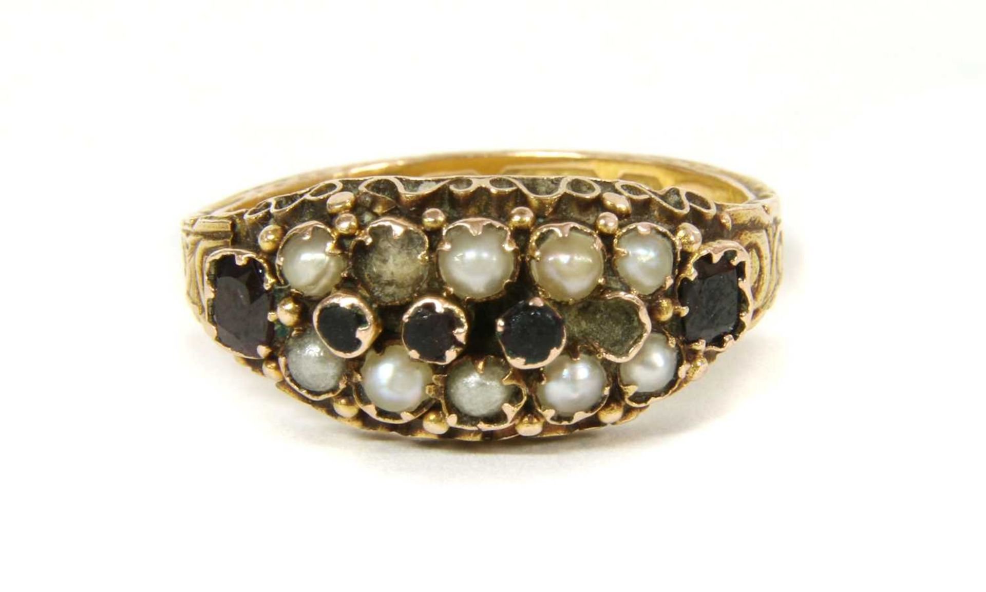A Victorian 15ct gold garnet and split pearl ring,