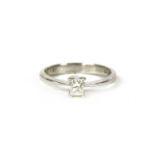 A white gold single stone diamond ring,