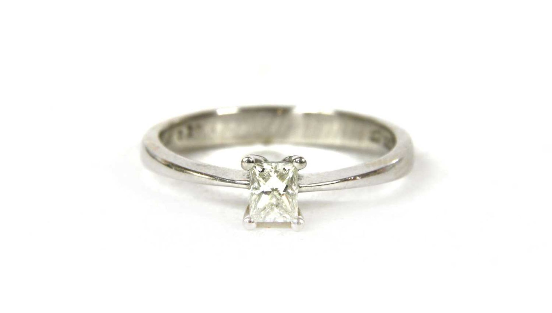 A white gold single stone diamond ring,