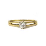 An 18ct gold single stone diamond ring,