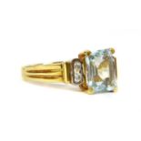 An 18ct gold aquamarine and diamond ring,