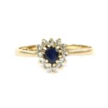 A 9ct gold sapphire and diamond cluster ring,