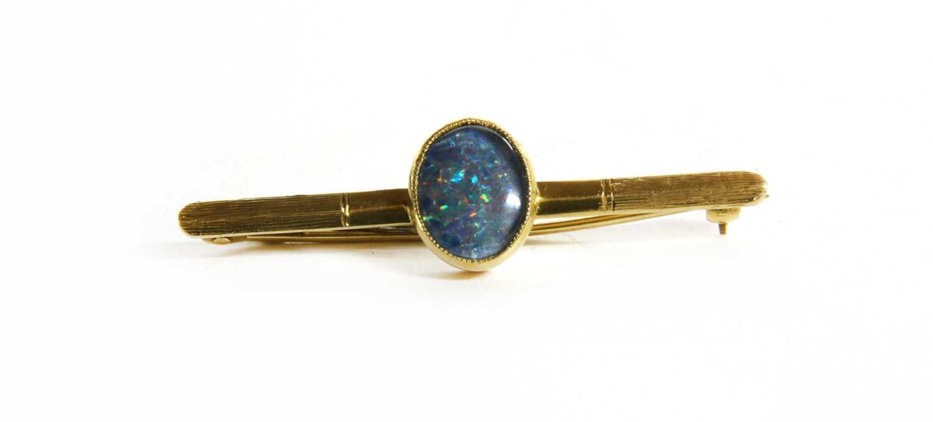 A gold opal triplet bar brooch,