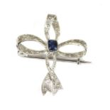 An Edwardian white gold sapphire bow brooch,