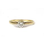 A gold single stone diamond ring,