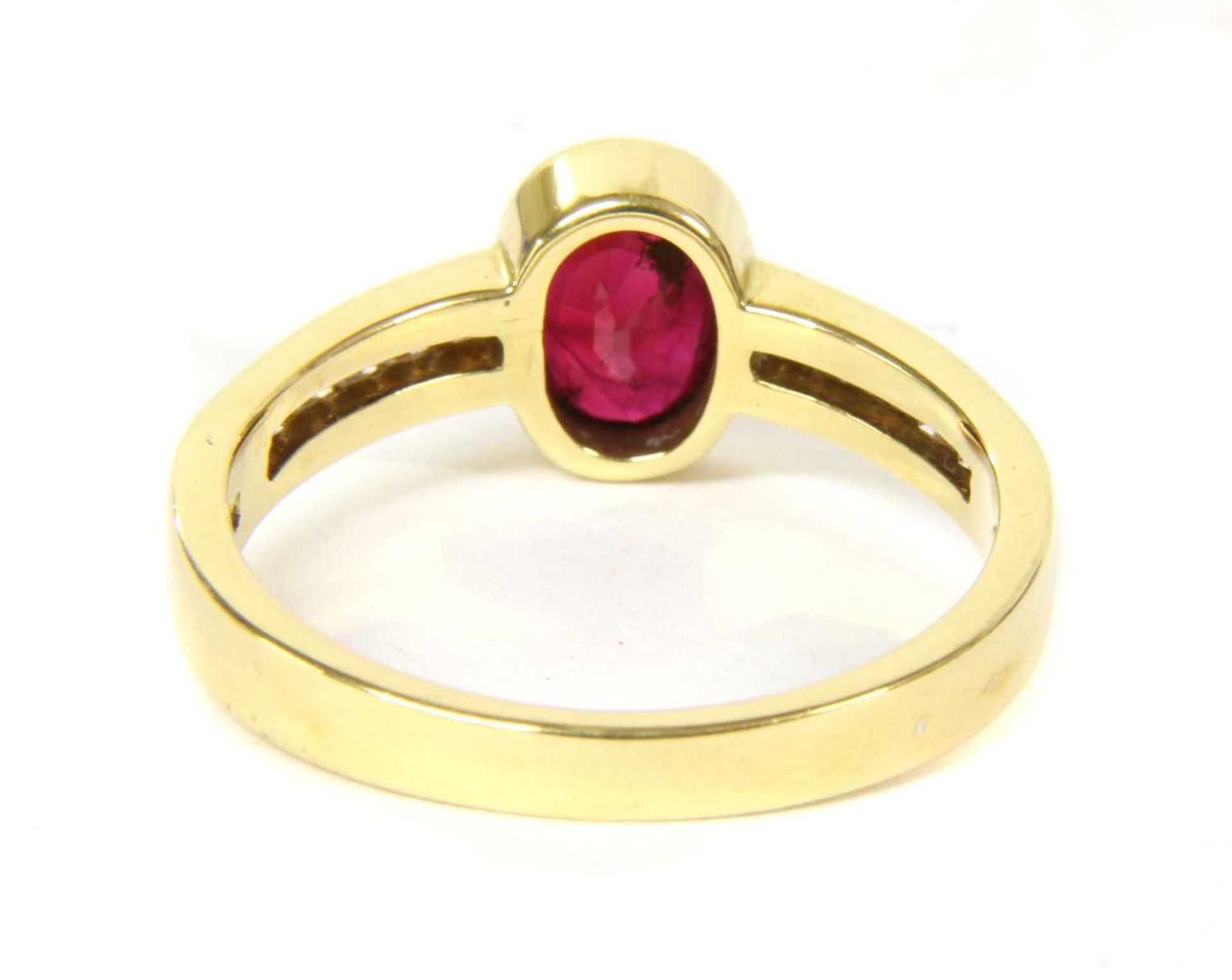 An 18ct gold ruby and diamond ring, - Bild 2 aus 3