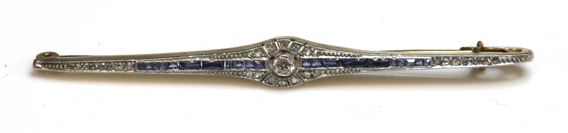 An Art Deco diamond, sapphire and synthetic sapphire bar brooch, c.1925,