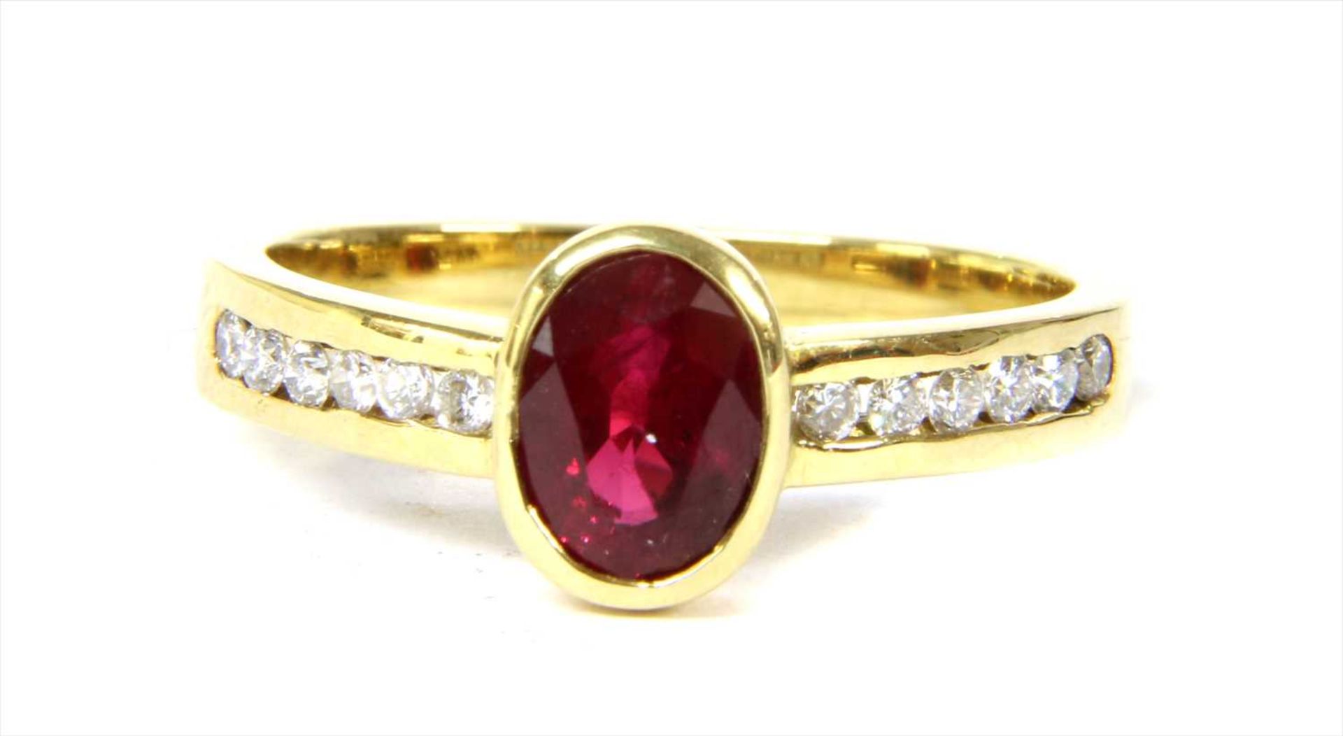 An 18ct gold ruby and diamond ring,