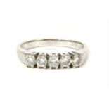 A white gold five stone diamond ring,