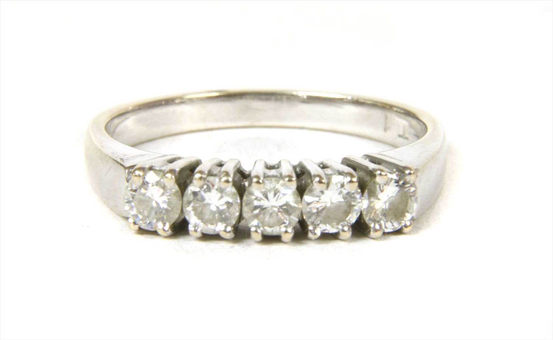 A white gold five stone diamond ring,