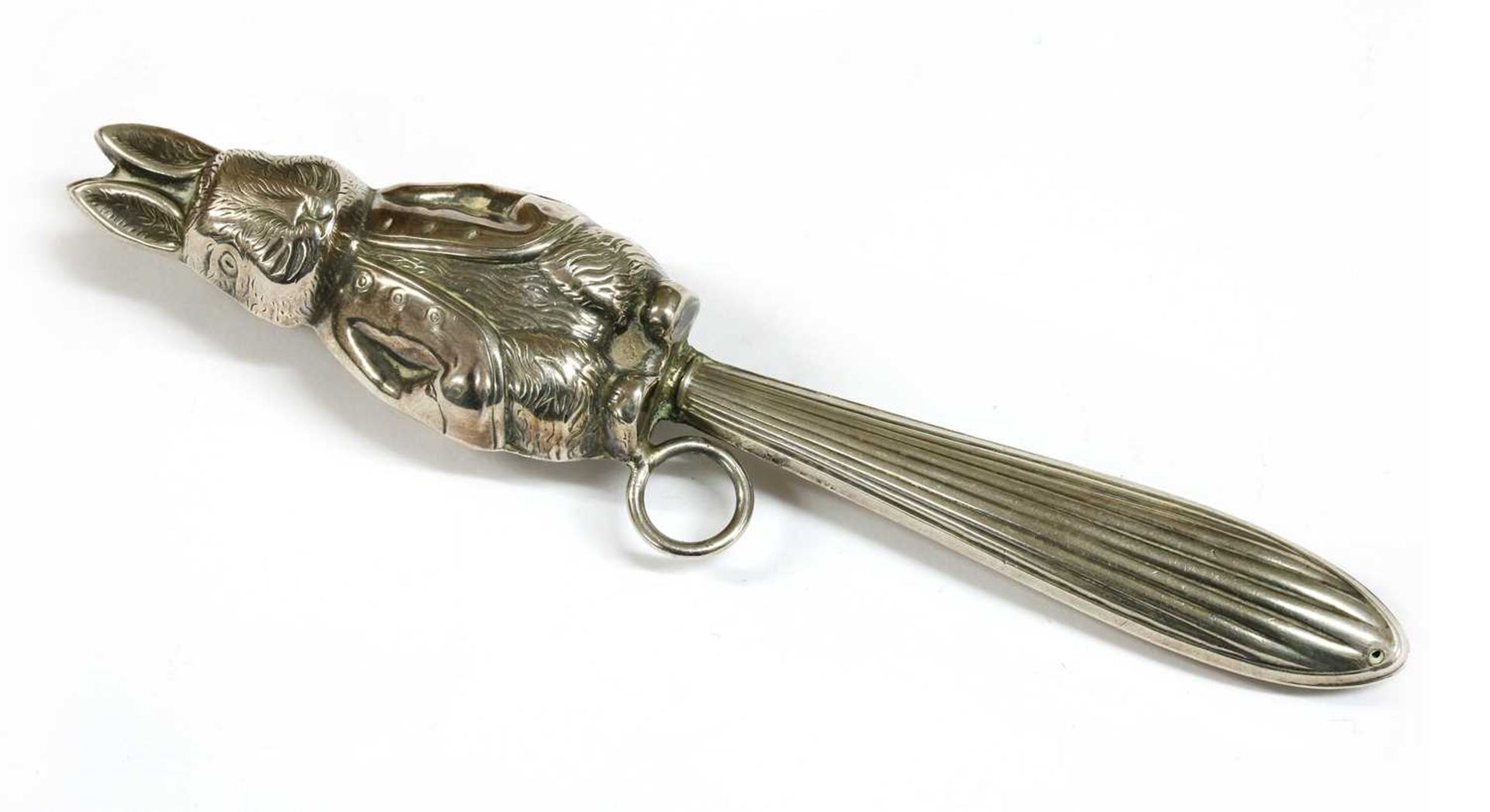 A silver baby's rattle,