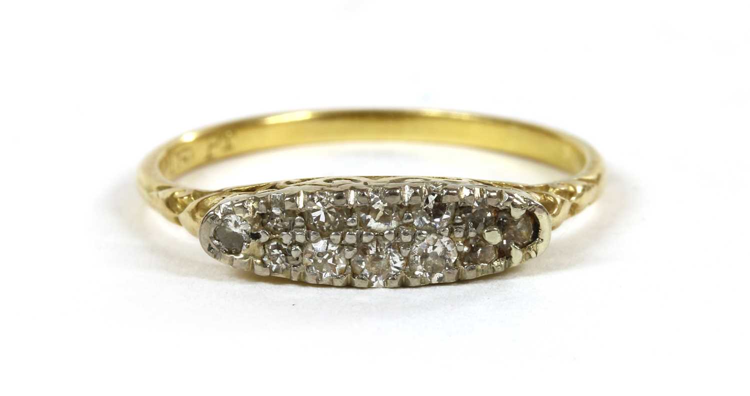 A gold boat shaped diamond ring,
