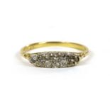 A gold boat shaped diamond ring,