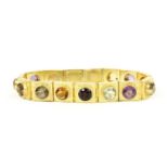 A Victorian gold assorted gemstone panel bracelet,