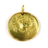 A French 18ct gold Cancer zodiac pendant, by Georges Lenfant,