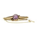 A Russian gold amethyst brooch,