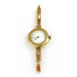 A ladies' 18ct gold pin set mechanical bracelet watch,