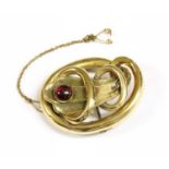 A Victorian gold garnet brooch,