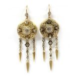 A pair of Continental gold diamond drop earrings,