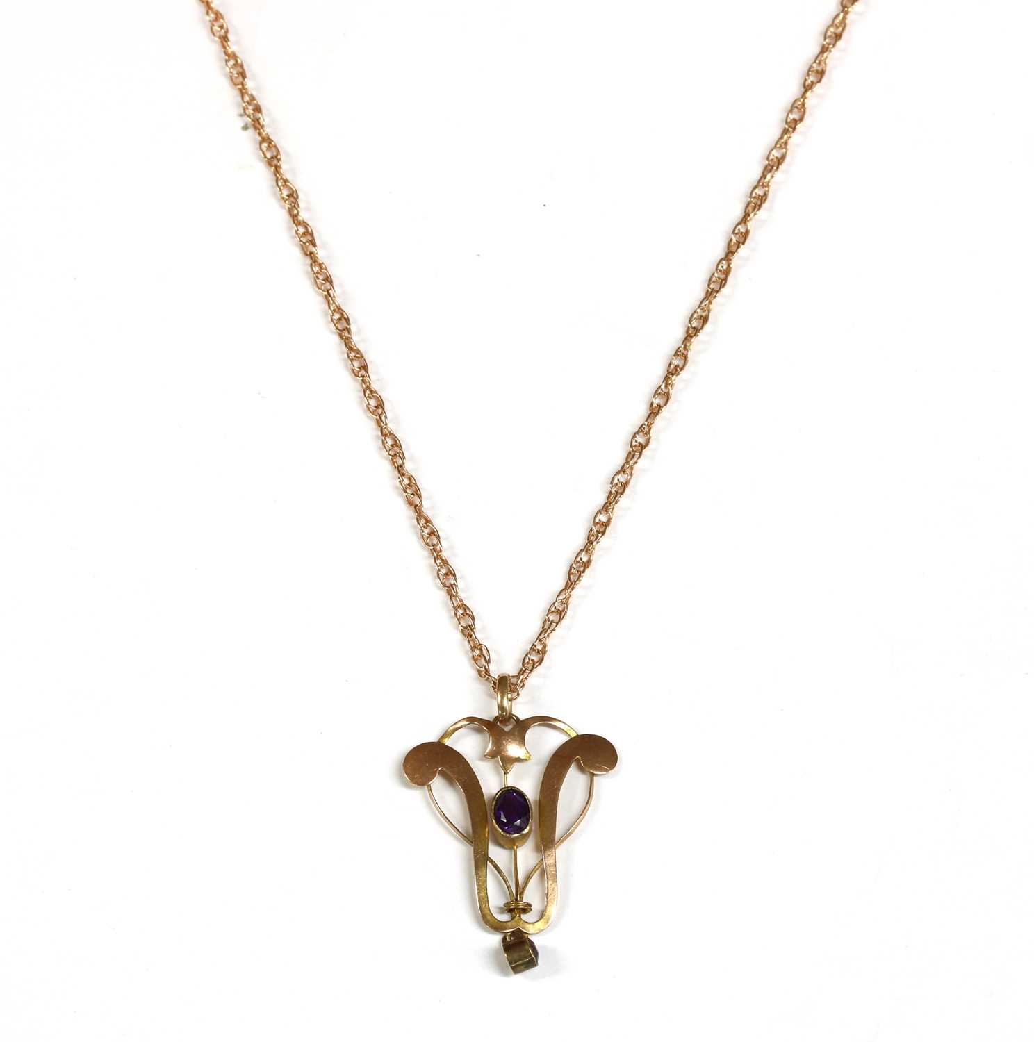 An Edwardian gold amethyst pendant,