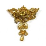 An early Victorian gold mounted citrine brooch/pendant, c.1840,