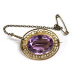 An gold amethyst and split pearl brooch,