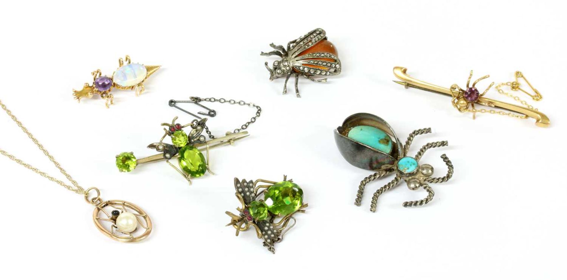 A collection of insect jewellery,