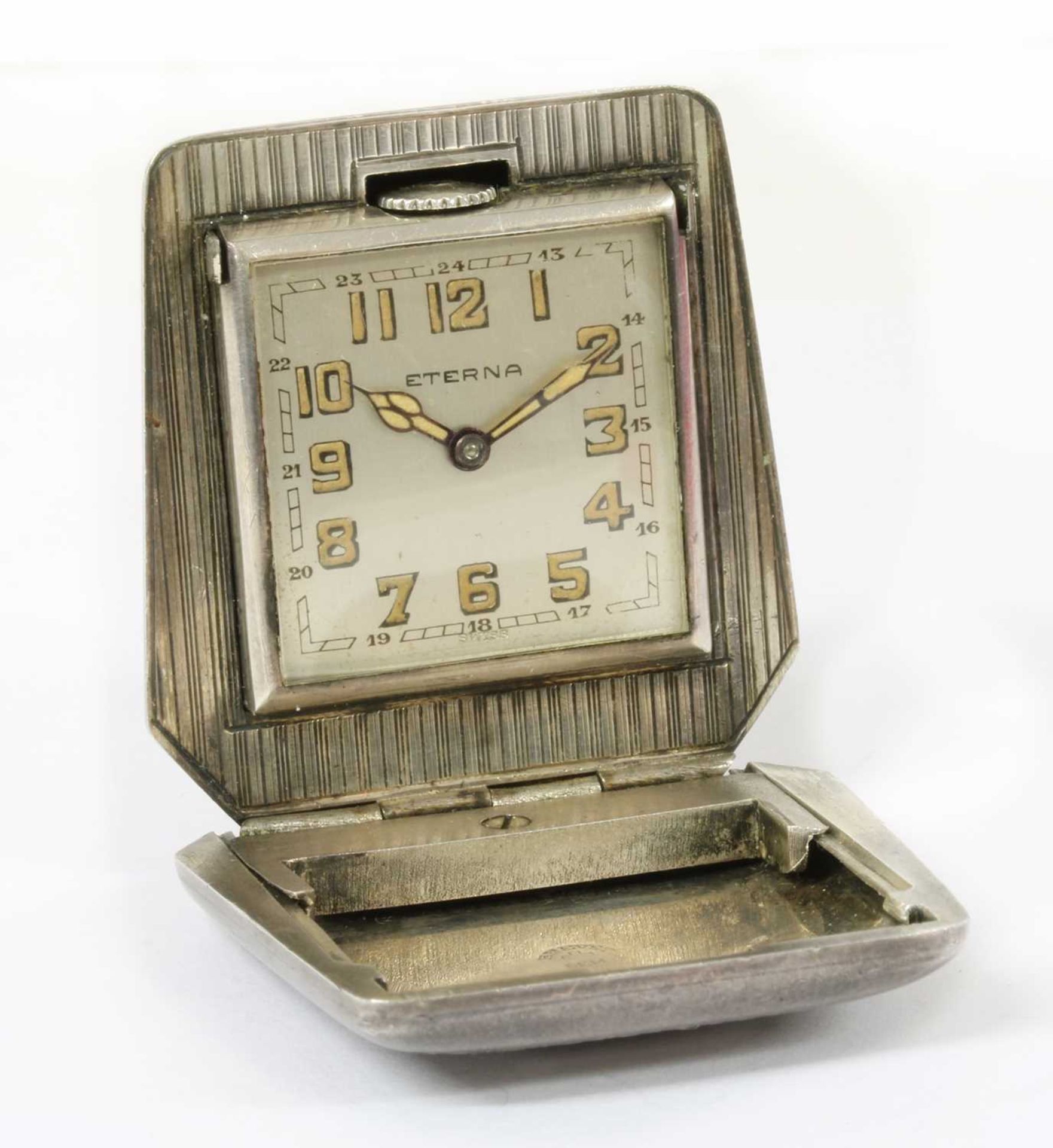 An Art Deco silver Eterna purse watch,
