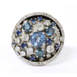 A white gold and platinum diamond and assorted gemstone cluster ring,