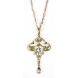 An Edwardian gold aquamarine and split pearl pendant,