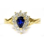 A gold sapphire and diamond cluster ring,
