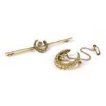 A gold diamond and emerald crescent bar brooch,