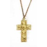 A carved ivory cross,