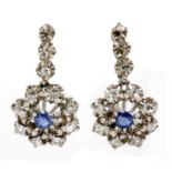 A pair of Continental platinum sapphire and diamond cluster earrings,