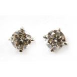 A pair of 9ct white gold diamond stud earrings,