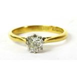 An 18ct gold single stone diamond ring,