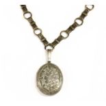 A Victorian silver locket and collar,