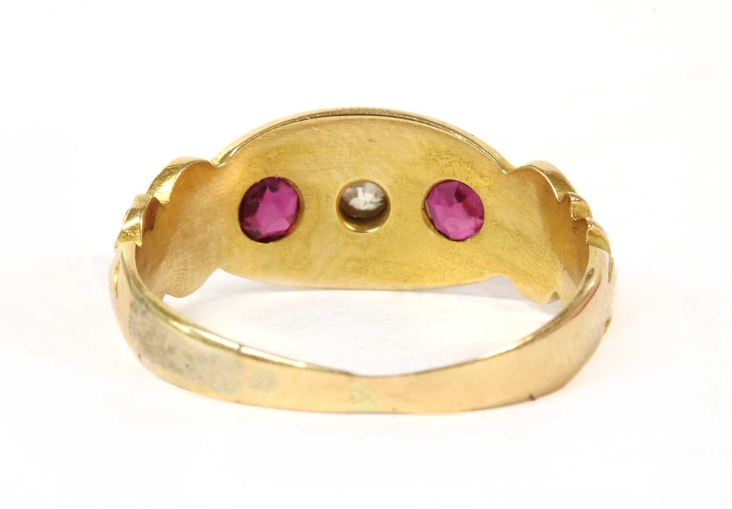 An 18ct gold three stone diamond and ruby set ring, - Image 2 of 3