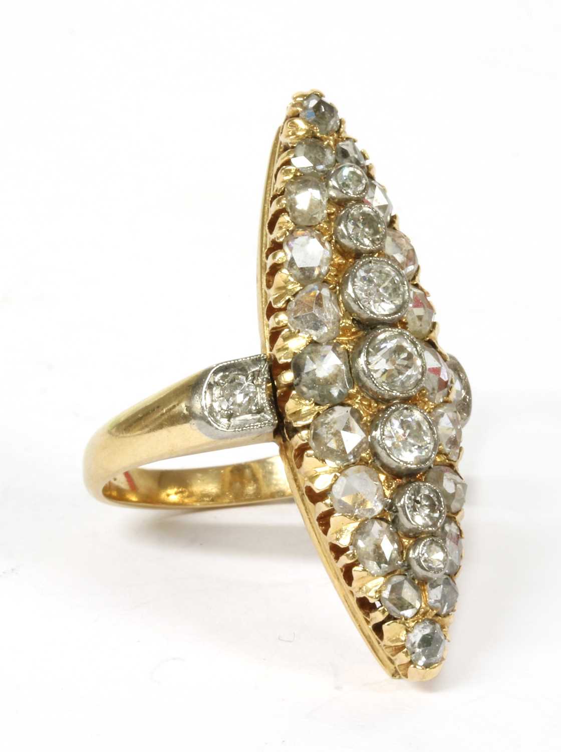 A gold navette shaped diamond cluster ring,