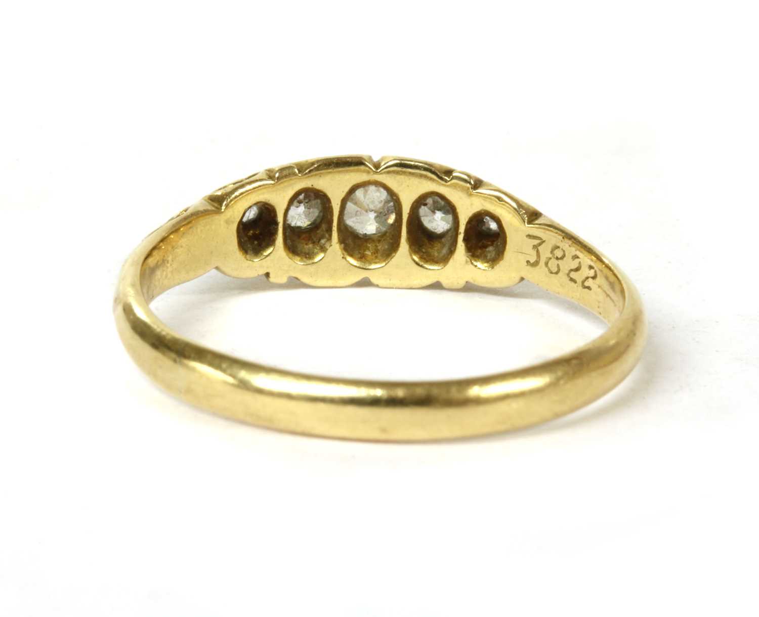 An 18ct gold boat shaped five stone diamond ring, - Image 3 of 3