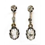 A pair of silver and gold rose cut diamond earrings,