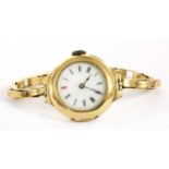 A ladies' 18ct gold mechanical bracelet watch,